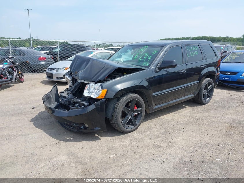 2007 Jeep Grand Cherokee Srt8, Удар спереди, IAAI, VIN 1J8HR783X7C512737 — фото 2