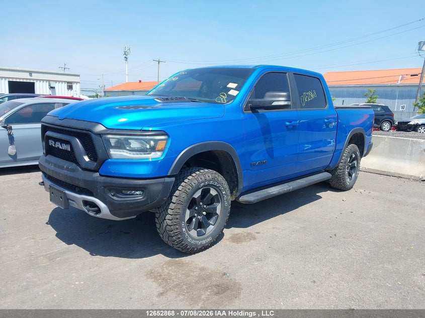 2022 RAM 1500, Repossession, IAAI, VIN 1C6SRFLT1NN437949 — photo 2