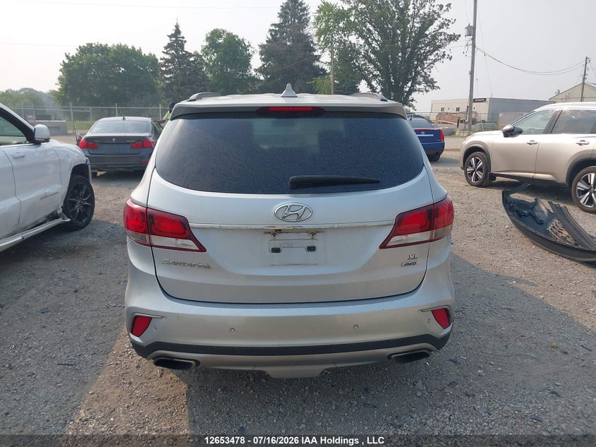 2018 Hyundai Santa Fe Se/Limited VIN: KM8SNDHF2JU278141 Lot: 12653478