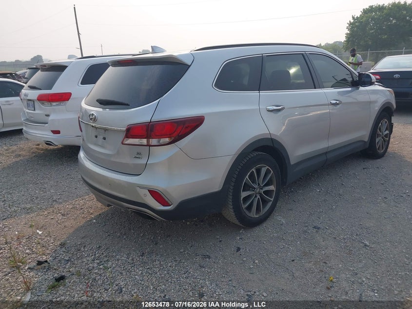 2018 Hyundai Santa Fe Se/Limited VIN: KM8SNDHF2JU278141 Lot: 12653478
