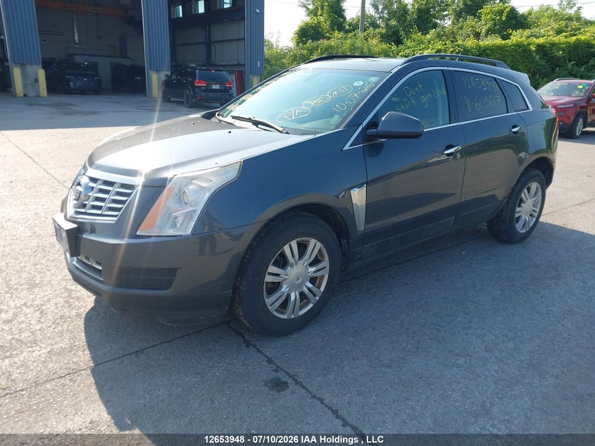 2013 Cadillac SRX, Charity, IAAI, VIN 3GYFNAE30DS605617 — photo 2