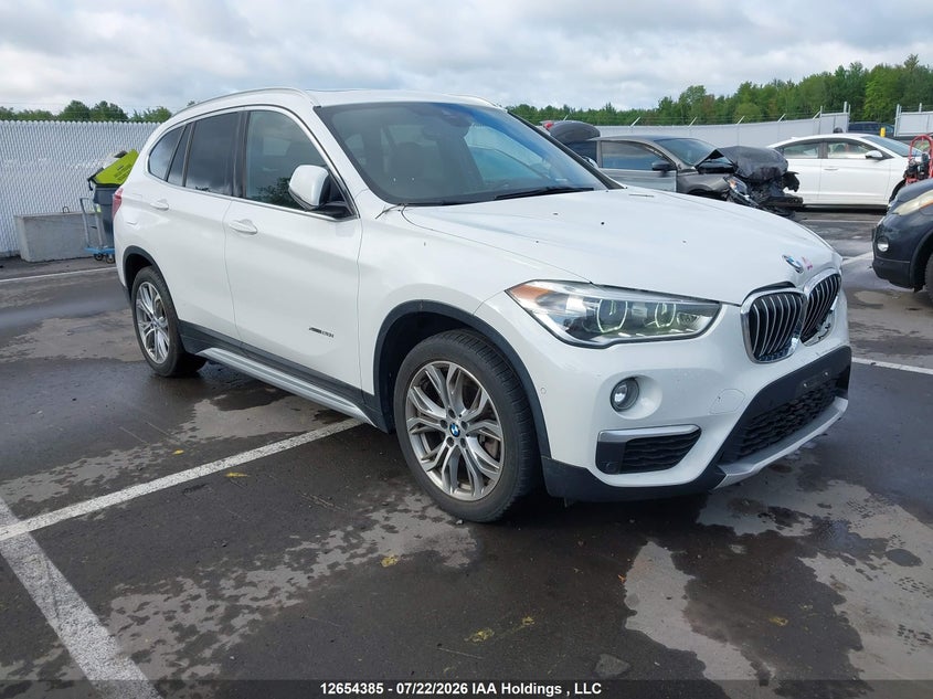 Vin: wbxht3c34h5f83601, lot: 3056313, bmw x1 xdrive28i 2017 img_1