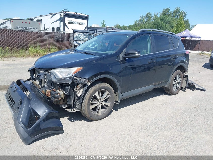2018 Toyota RAV 4, Rear, IAAI, VIN 2T3RFREV3JW818527 — photo 2