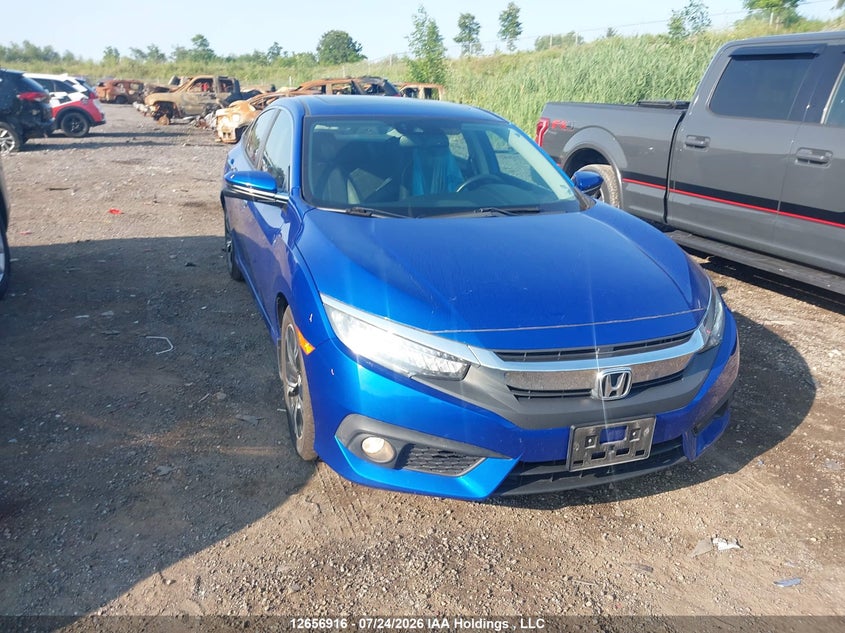 Vin: 2hgfc1f99hh103973, lot: 3058991, honda civic touring 2017 img_1