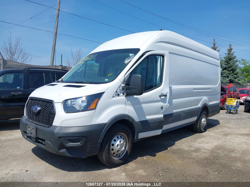 2024 Ford Transit, Left Side, IAAI, VIN 1FTBR3U88RKA99751 — photo 2