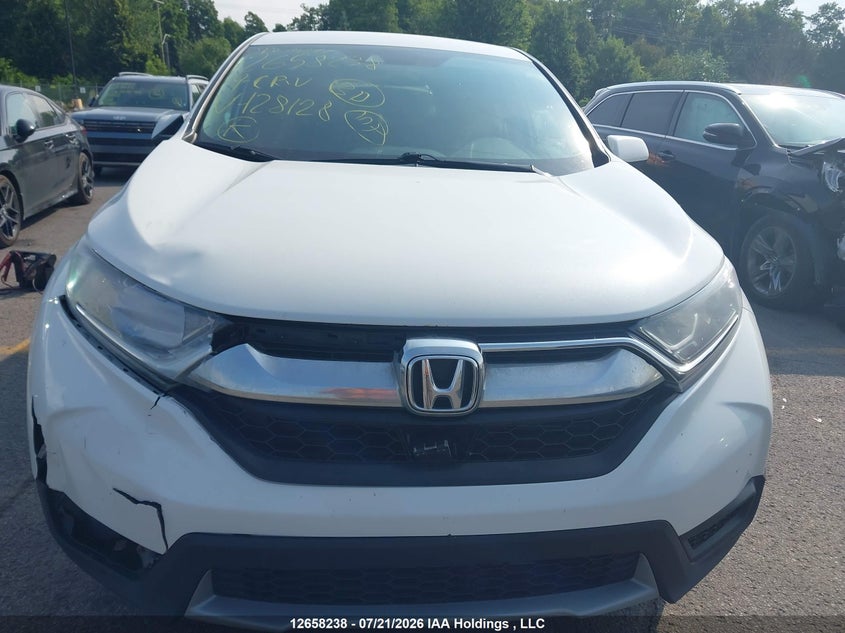2019 Honda Cr-V Lx VIN: 2HKRW2H2XKH128128 Lot: 12658238