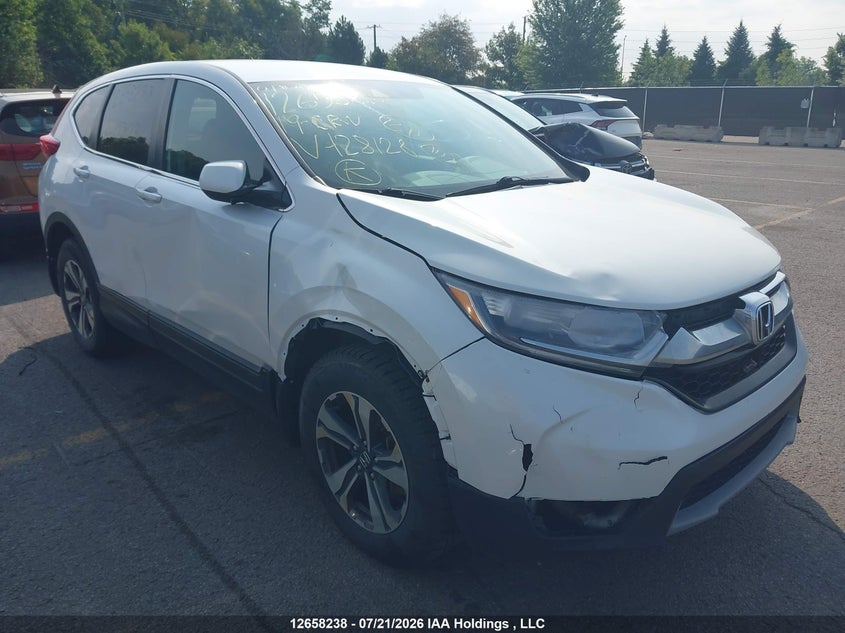 2019 Honda Cr-V Lx VIN: 2HKRW2H2XKH128128 Lot: 12658238