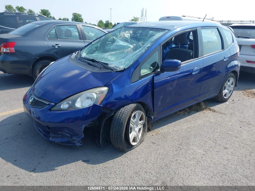 2013 Honda Fit, Rollover, IAAI, VIN LUCGE8G53D3006794 — photo 2
