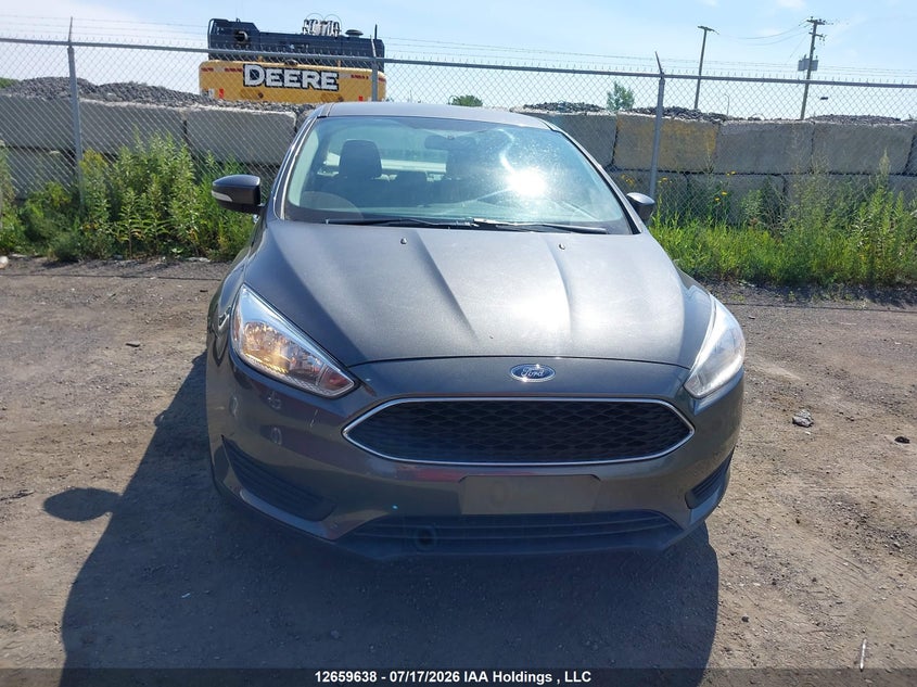 2015 Ford Focus Se VIN: 1FADP3F28FL370987 Lot: 12659638