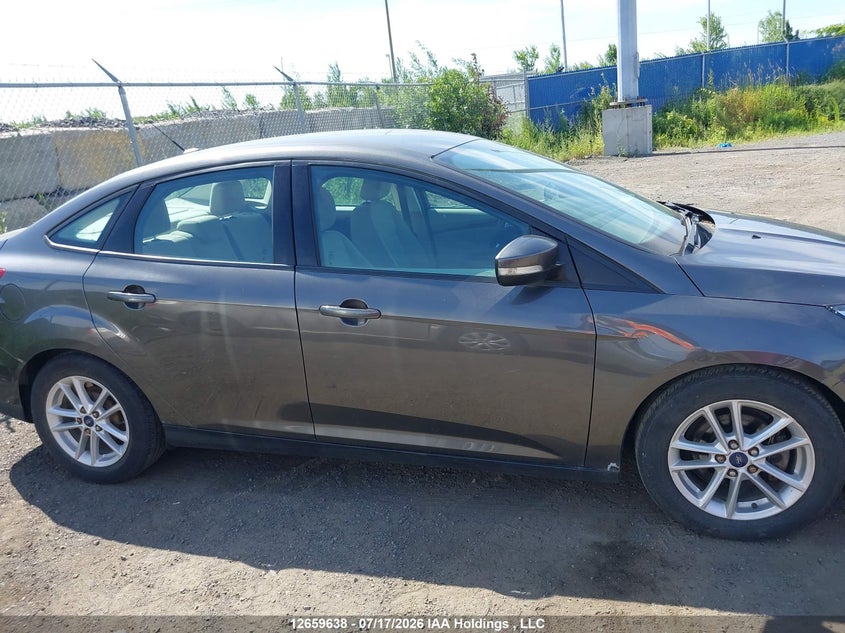 2015 Ford Focus Se VIN: 1FADP3F28FL370987 Lot: 12659638