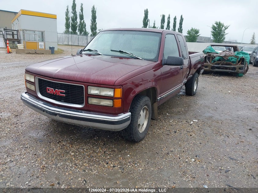 1997 GMC Sierra, Левый бок, IAAI, VIN 2GTEC19R6V1558855 — фото 2