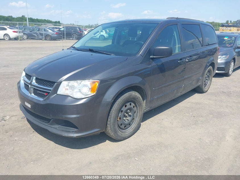 2015 Dodge Caravan, Левый бок, IAAI, VIN 2C4RDGBGXFR744265 — фото 2