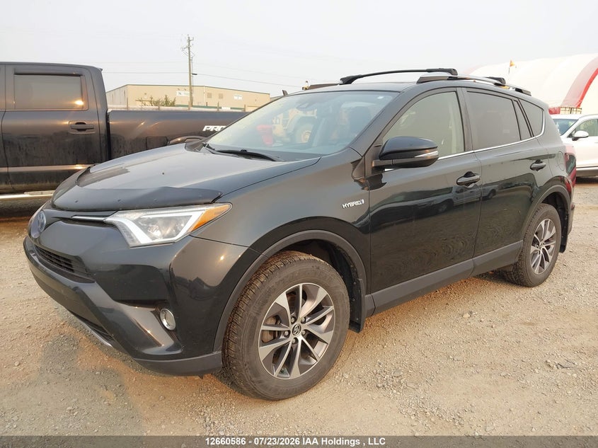 2018 Toyota RAV 4, Град, IAAI, VIN JTMRJREV8JD159551 — фото 2