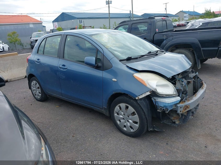 Vin: jtdkt9k39a5297818, lot: 3064148, toyota yaris le/rs 2010 img_1