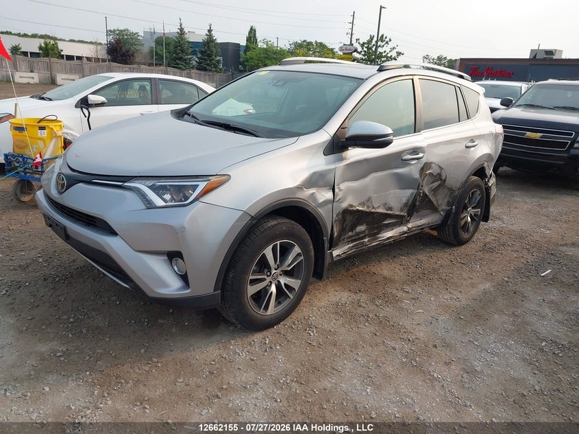 2017 Toyota RAV 4, Left Side, IAAI, VIN 2T3WFREV6HW400024 — photo 2
