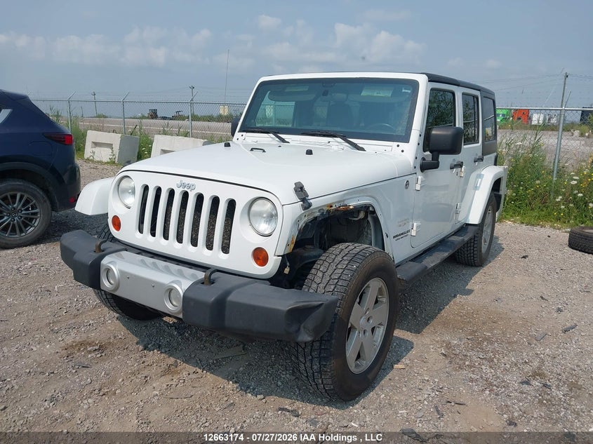 2011 Jeep Wrangler, Left Side, IAAI, VIN 1J4BA5H15BL555165 — photo 2