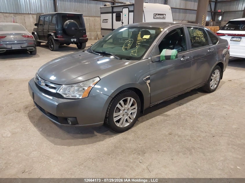 2009 Ford Focus, Left Side, IAAI, VIN 1FAHP37N19W154170 — photo 2