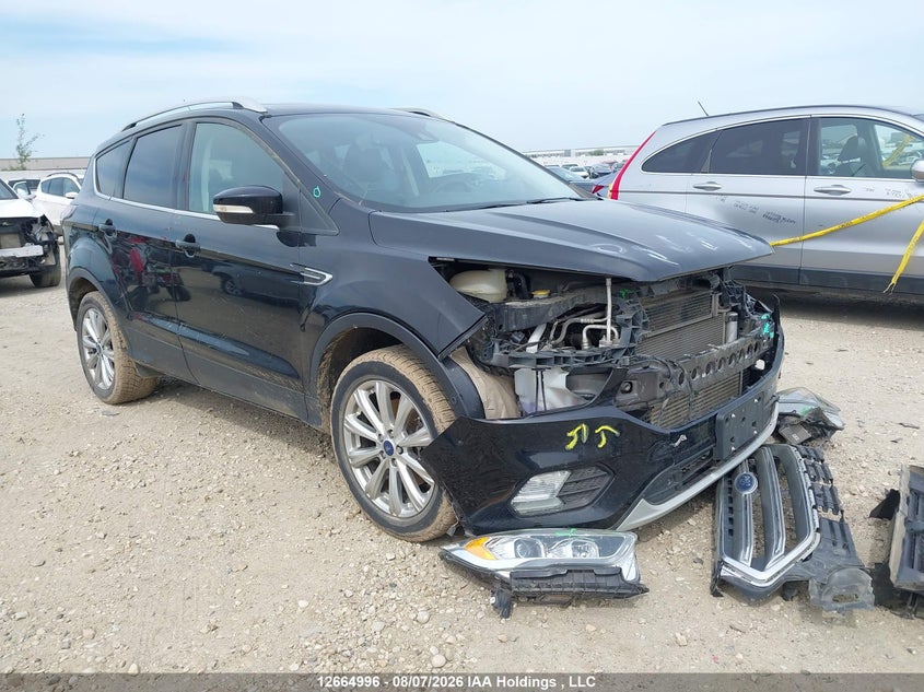 Vin: 1fmcu9j95hua85792, lot: 3067600, ford escape titanium 2017 img_1