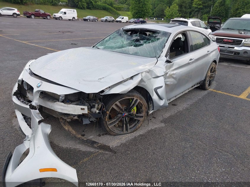 2015 BMW 4er, Rollover, IAAI, VIN WBA4B3C52FGV48308 — photo 2