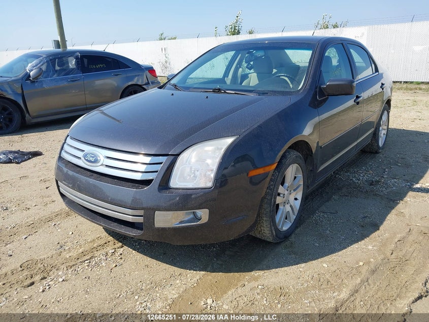 2007 Ford Fusion Sel, Удар сзади, IAAI, VIN 3FAHP02117R263649 — фото 2
