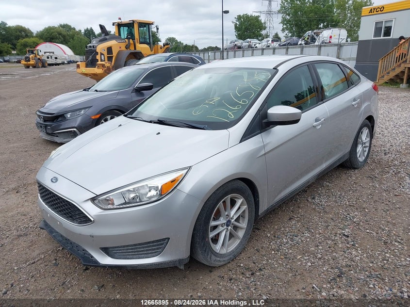 Vin: 1fadp3f20jl310789, lot: 3068584, ford focus se 20182