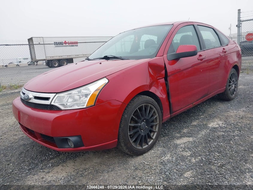 2009 Ford Focus, Left Front, IAAI, VIN 1FAHP36N49W245712 — photo 2