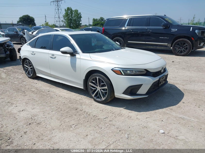 Vin: 2hgfe2f33ph109214, lot: 3068971, honda civic ex 4dr 2023 img_1