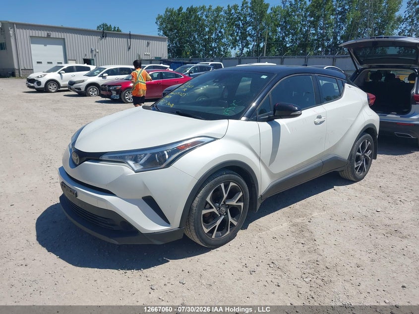 2019 Toyota C-HR, Right Side, IAAI, VIN NMTKHMBX2KR079723 — photo 2