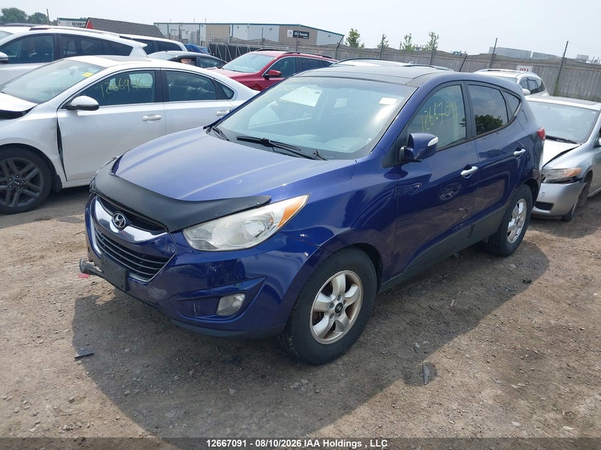2012 Hyundai Tucson, Front, IAAI, VIN KM8JUCAC5CU350493 — photo 2