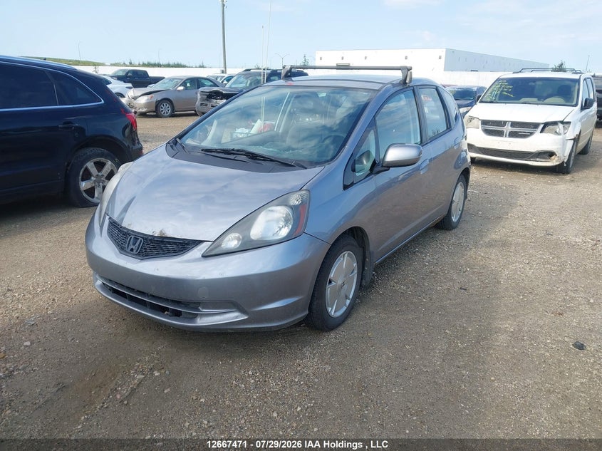 2010 Honda Fit Lx, Правый бок, IAAI, VIN JHMGE8H5XAC801225 — фото 2