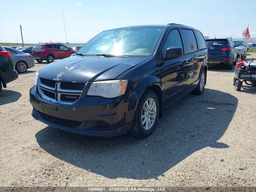 2014 Dodge Caravan, Благотворительность, IAAI, VIN 2C4RDGBG7ER197695 — фото 2