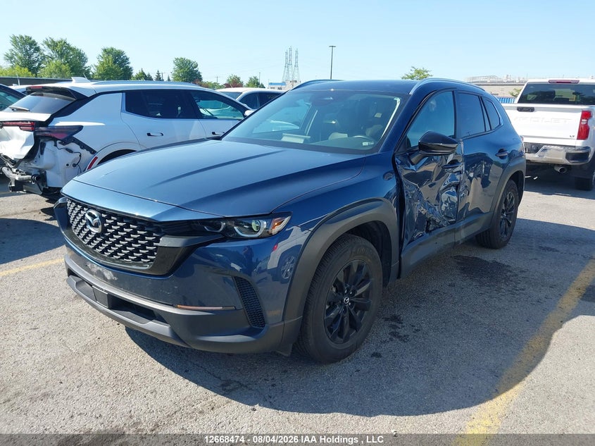 2025 Mazda CX-50, Левый бок, IAAI, VIN 7MMVABCM3SN348149 — фото 2
