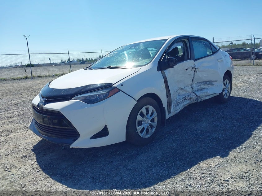 2018 Toyota Corolla, Левый бок, IAAI, VIN 2T1BURHE8JC981655 — фото 2