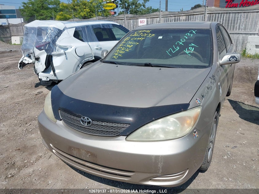 2003 Toyota Camry, Rear, IAAI, VIN JTDBF30K630134509 — photo 2