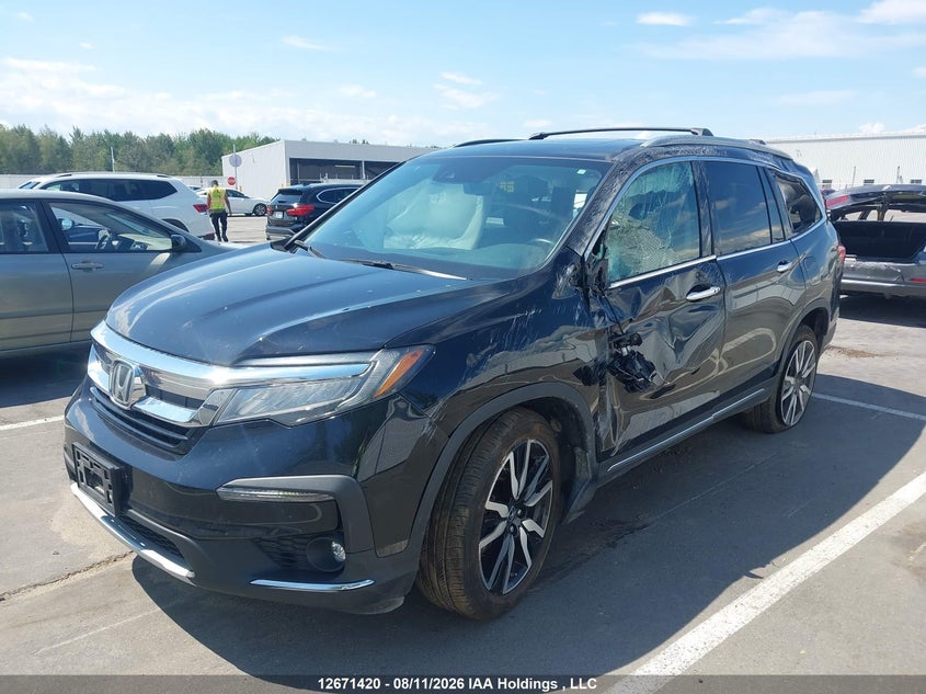 2021 Honda Pilot, Rollover, IAAI, VIN 5FNYF6H96MB506480 — photo 2