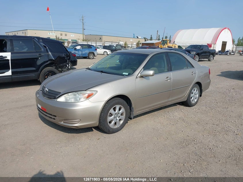 2003 Toyota Camry, Удар сзади, IAAI, VIN JTDBF32K330128597 — фото 2