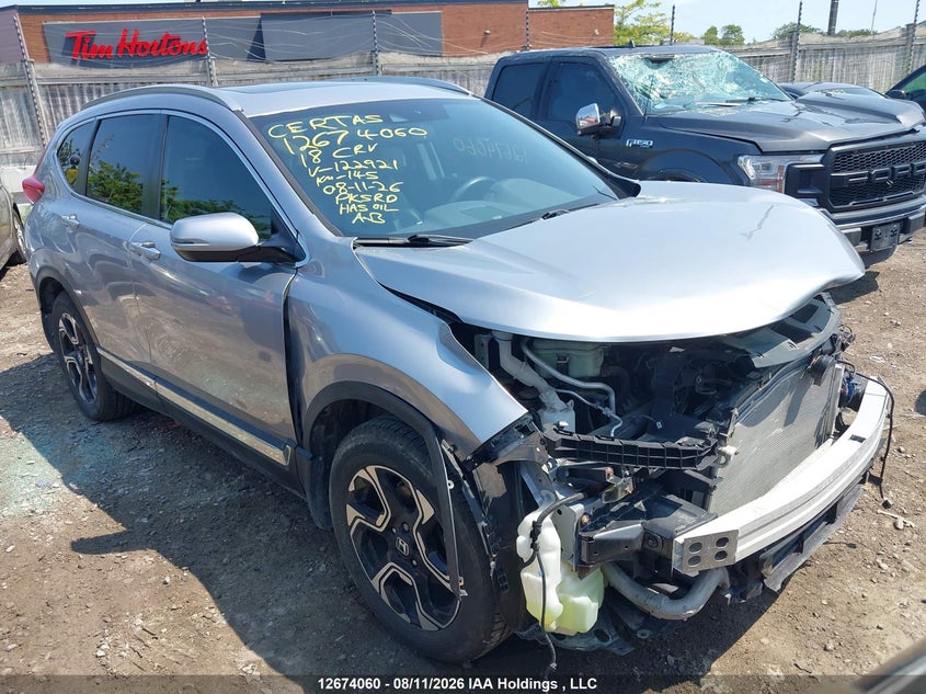 Vin: 2hkrw2h94jh122921, lot: 3077543, honda cr-v touring 2018 img_1