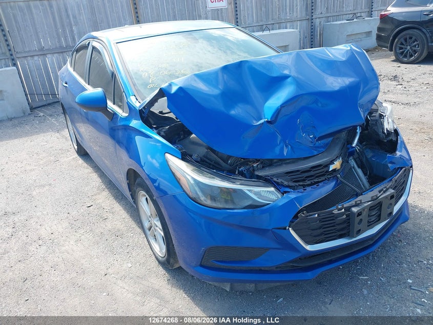 2017 Chevrolet Cruze Lt Auto, Удар спереди, IAAI, VIN 3G1BE5SM8HS565911