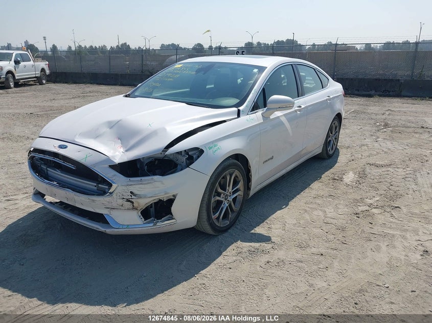 Vin: 3fa6p0ru6kr191234, lot: 3078416, ford fusion hybrid titanium 20192