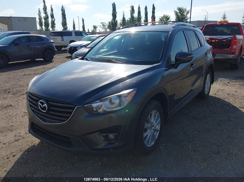 2016 Mazda CX-5, Right Side, IAAI, VIN JM3KE4CY4G0769315 — photo 2