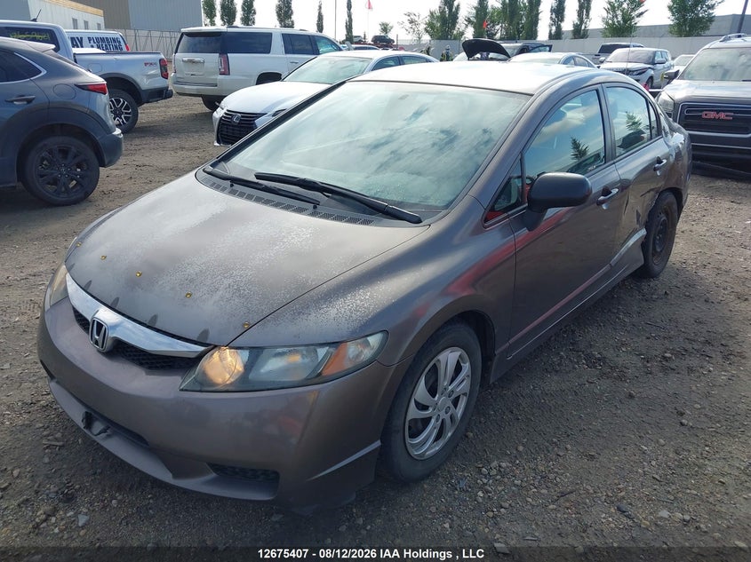 2009 Honda Civic Dx-G, Left Side, IAAI, VIN 2HGFA16499H026551 — photo 2