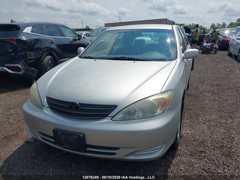 2004 Toyota Camry, Благодійність, IAAI, VIN 4T1BF32K64U577438 — фото 2