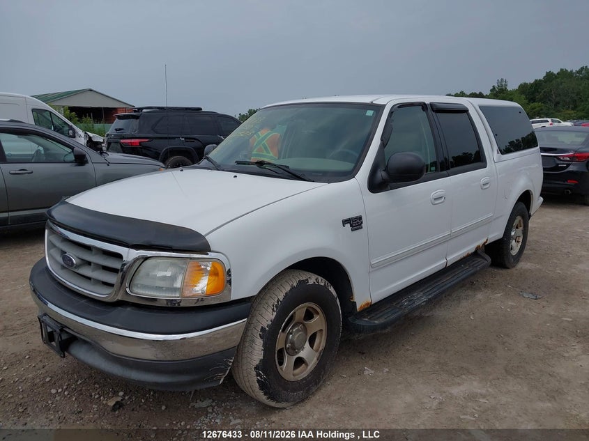 2003 Ford F-150, Charity, IAAI, VIN 1FTRW07663KD22523 — photo 2