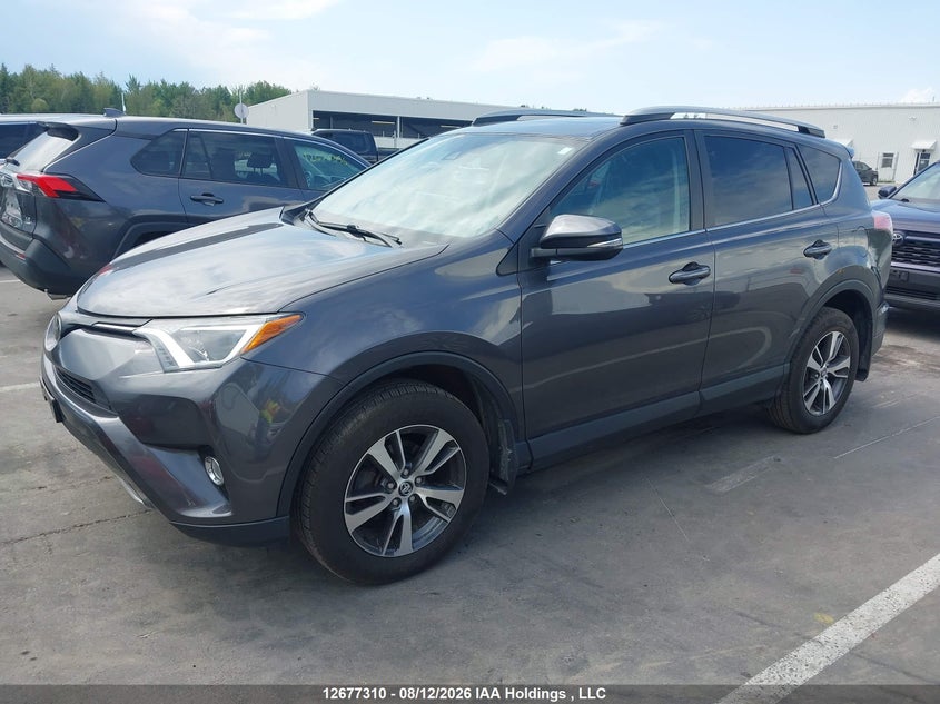2017 Toyota RAV 4, Water, IAAI, VIN 2T3RFREV9HW591791 — photo 2