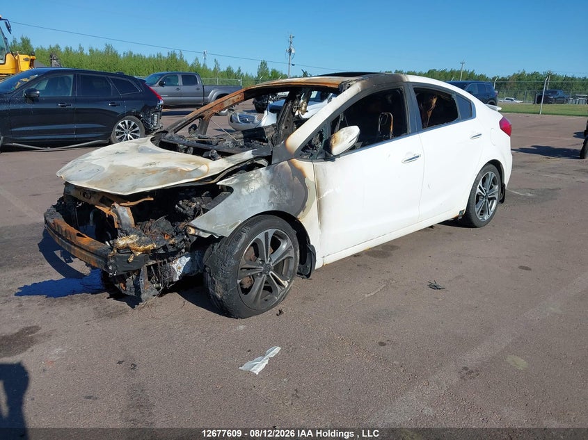 2015 Kia Forte, Повністю згоріле, IAAI, VIN KNAFX4A82F5288873 — фото 2