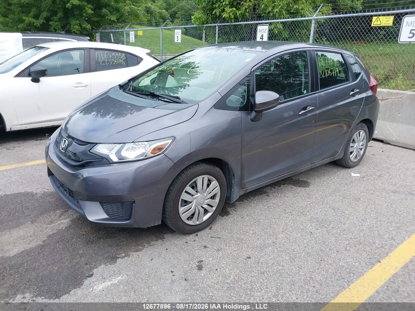 2015 Honda Fit, Правый бок, IAAI, VIN 3HGGK5H56FM105719 — фото 2