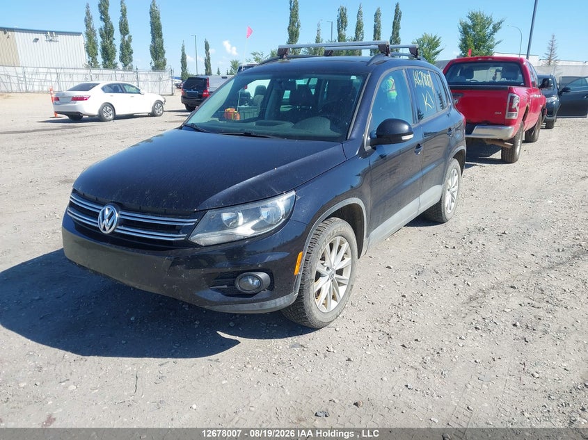 2014 Volkswagen Tiguan, Charity, IAAI, VIN WVGJV3AX3EW539764 — photo 2