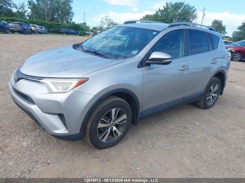 2018 Toyota RAV 4, Rear, IAAI, VIN 2T3BFREV2JW732529 — photo 2