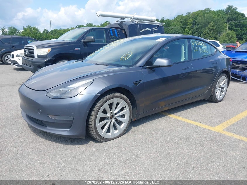 2022 Tesla Model 3, Удар сзади, IAAI, VIN 5YJ3E1EBXNF277732 — фото 2