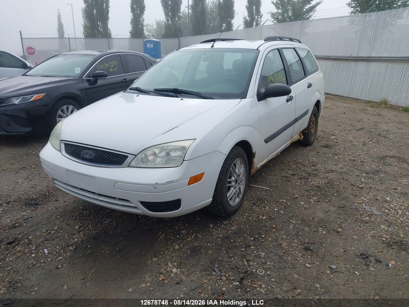 2005 Ford Focus, Благотворительность, IAAI, VIN 1FAFP36N95W255217 — фото 2